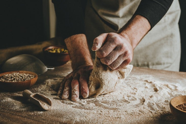 Person kneading dough