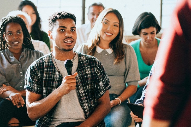 Person speaking at a community event