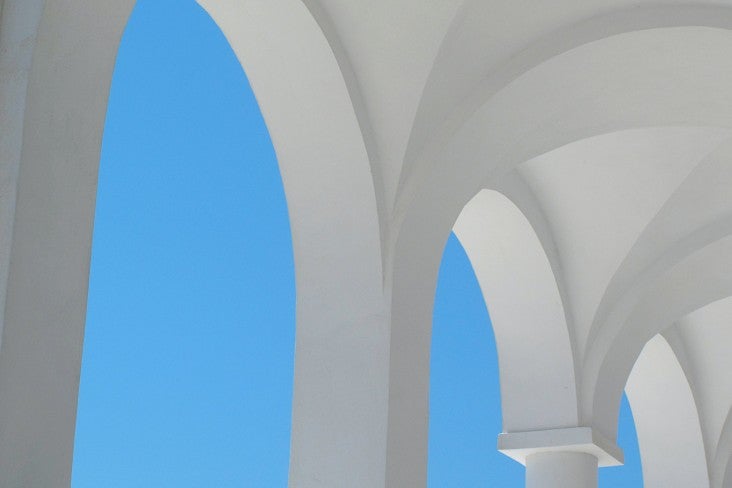 White arches against a blue sky