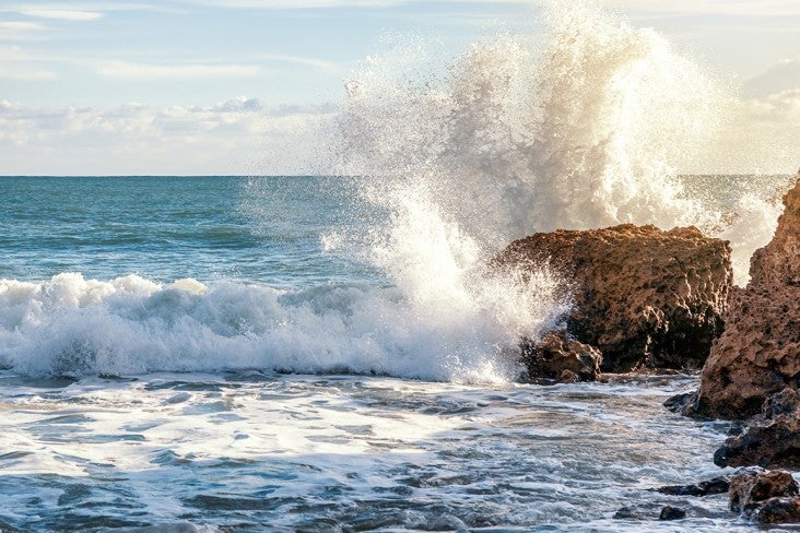 waves crashing on rocks