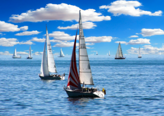 Sailing boats on a calm body of water 